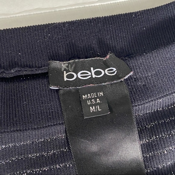 Bebe women black and silver stripes long sleeves fitted top. Size M/L. Used - Picture 4 of 9